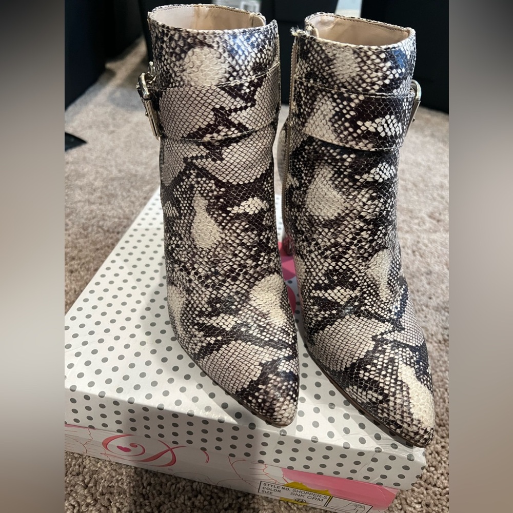 Snakeskin heeled boots